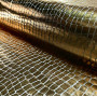 Polyesterjersey med folietrykk Stoff 150cm 80 Gold - 50cm